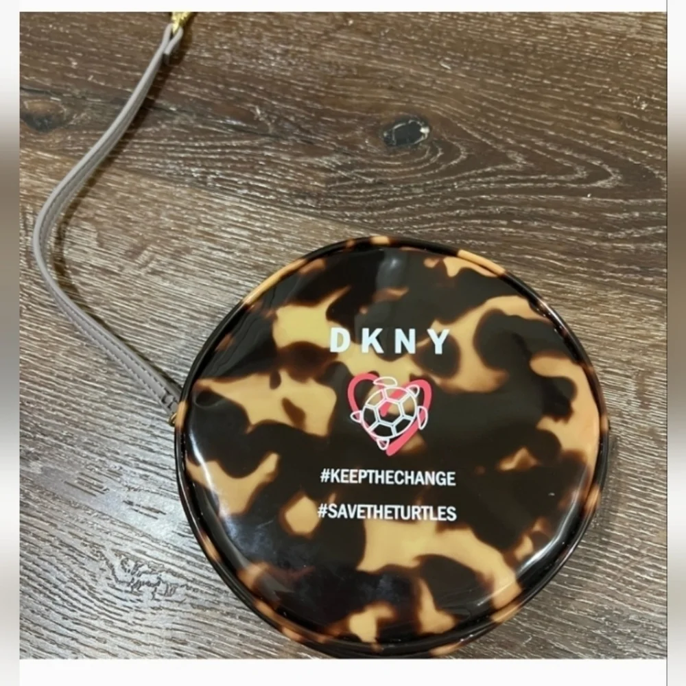 DKNY save the turtle wristlet in excellent condition